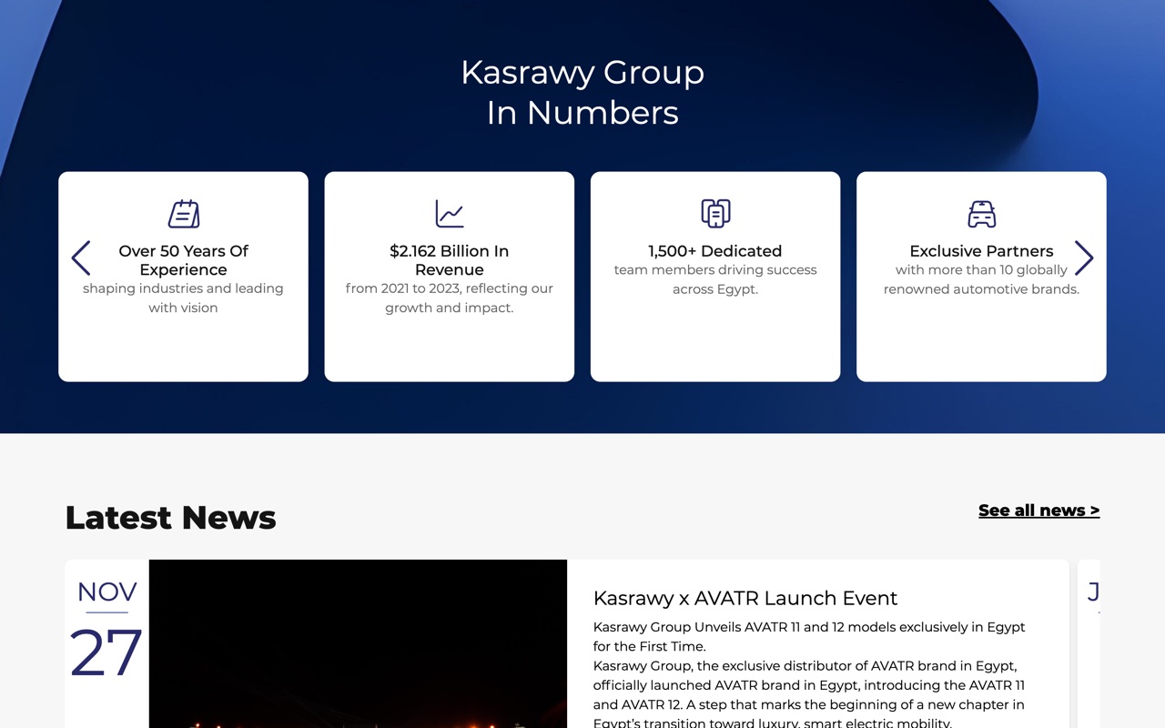 The Kasrawy Group In Numbers section on a laptop
