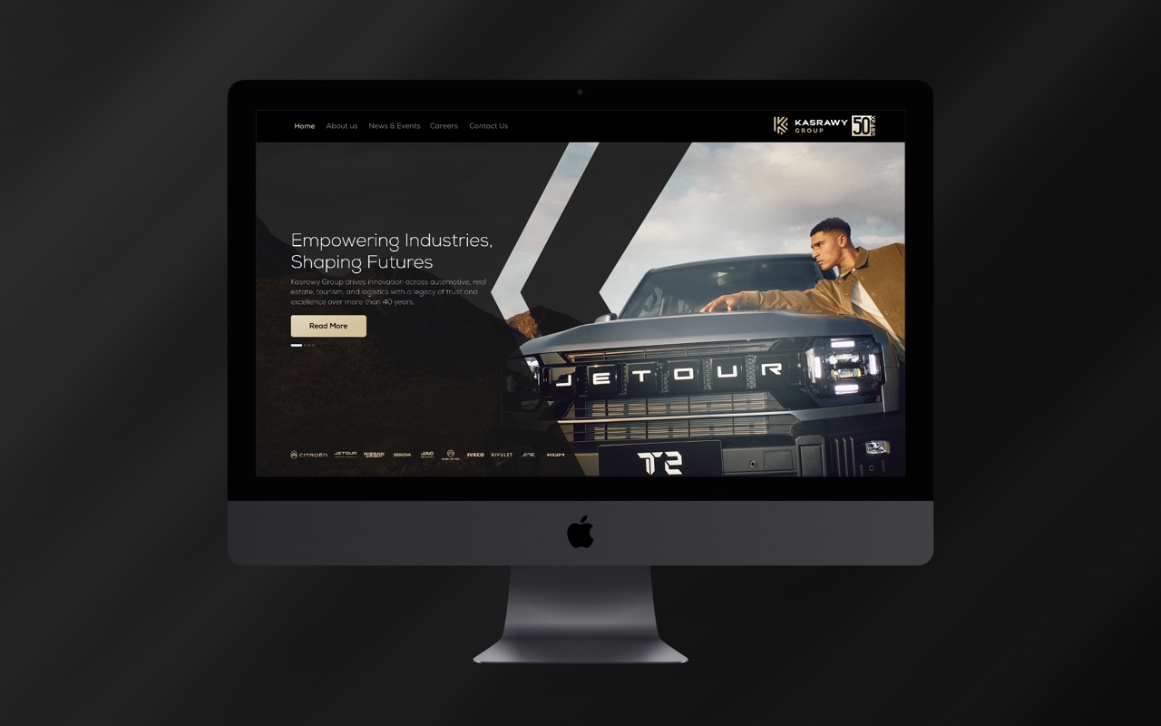 The Kasrawy Group home page on an iMac