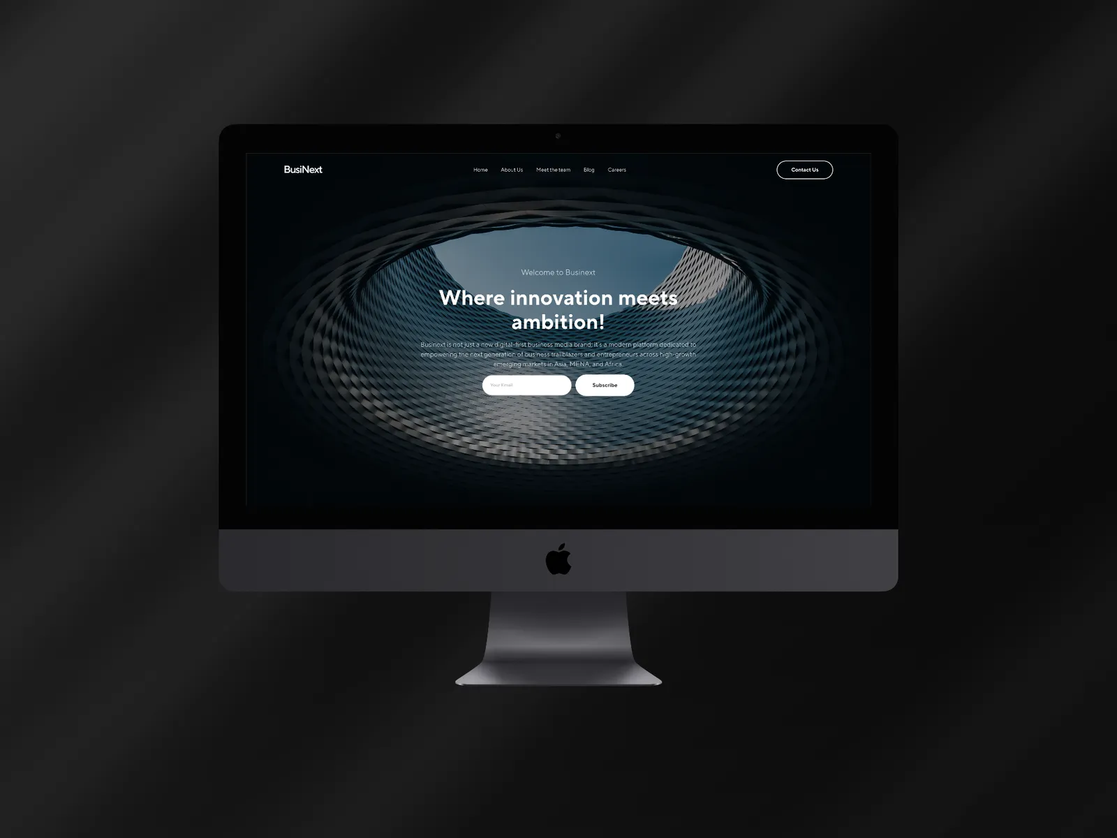 BusiNext, live site on a device mockup