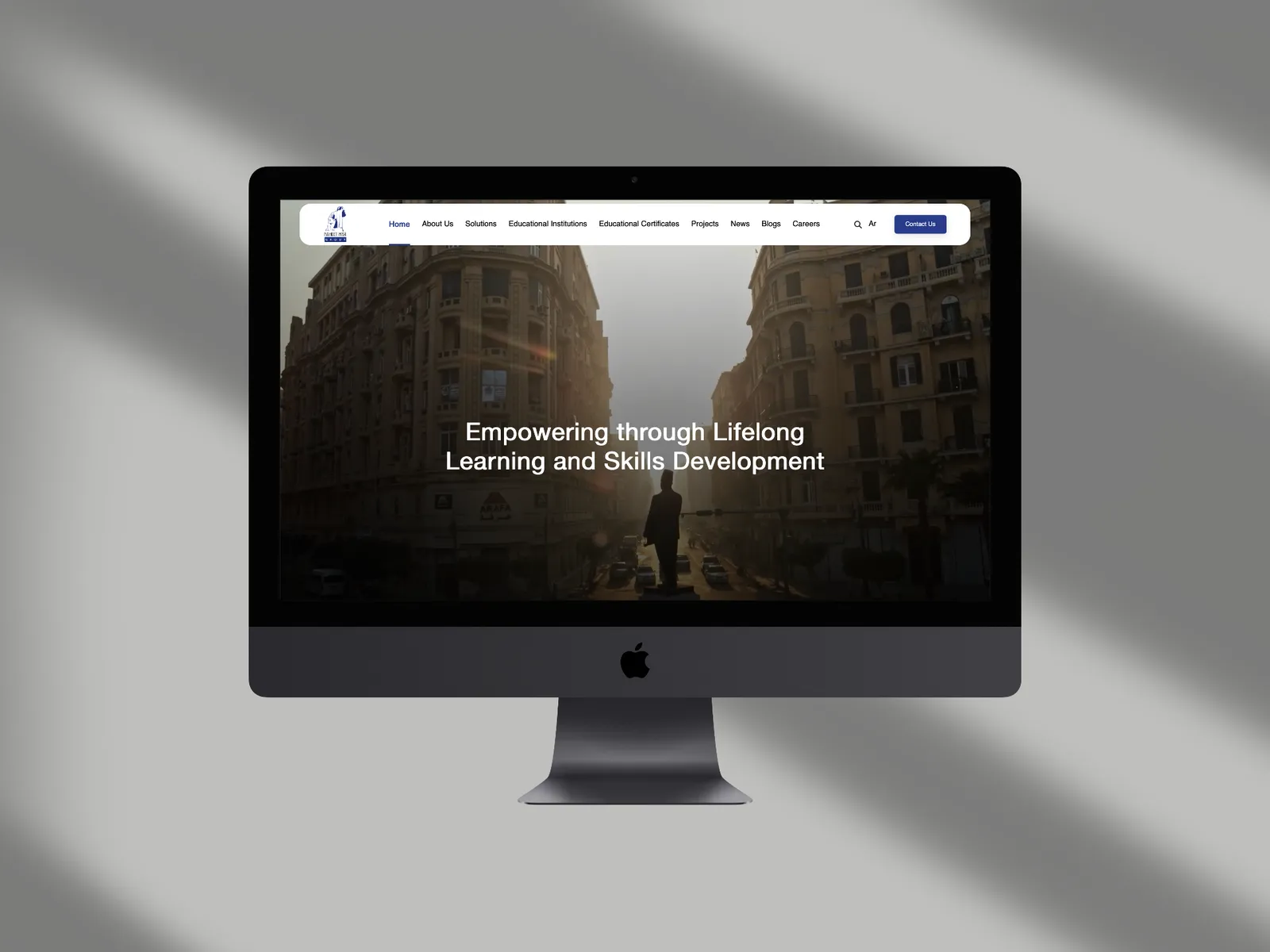 Nahdet Misr, live site on a device mockup (view 2)